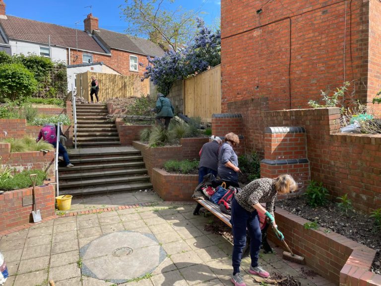 Parish volunteers planting the fishing for the moon garden