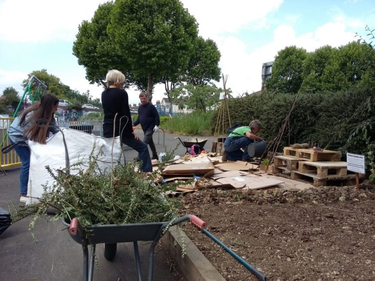 Parish volunteers creating the bug hotel