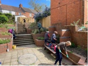Volunteers helping maintain the Fishing for the Moon Garden