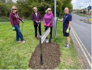 Friends of Shaftesbury Lake volunteers planting a street bed