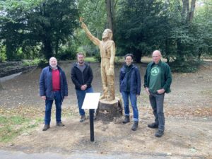 Councillors Chris Watts and Neil Hopkins at the opening of the Richard Jefferies Sculpture in the Town Gardens with volunteers from the Richard Jefferies Museum
