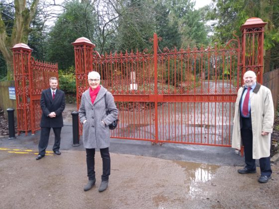 Councillors Chris Watts, Jane Milner-Barry and Neil Hopkins in front of the newly refurbished Town Gardens Gates